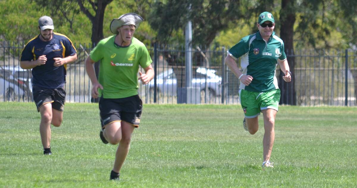 ALL SMILES: Western under 23s coach Tim Ryan joins in during pre-season training. Photo: JEN HOAR