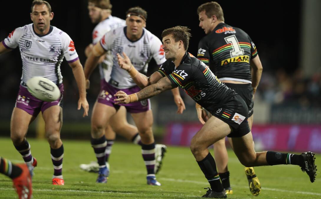 QUICK SHIFT: Wayde Egan returned to Carrington Park on Saturday night to take on Melbourne, but this time he was in Penrith colours. Photo: PHIL BLATCH