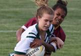GOT HER: This Riverina defender wraps up Western fullback Sophie Stammers at Wagga on Friday night. 