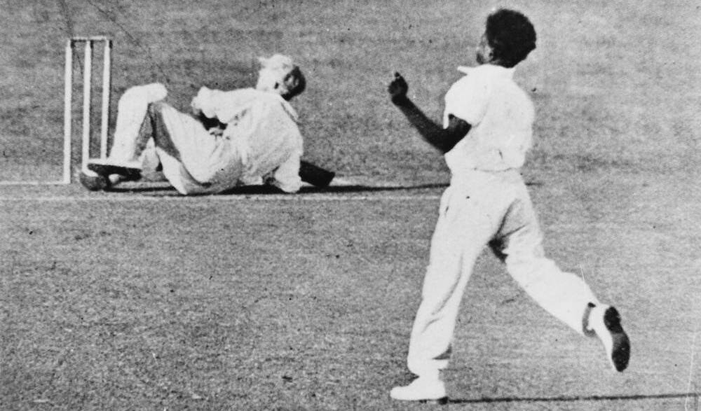Eddie Gilbert bowling to Sir Donald Bradman. (Credit: Unidentified. Copied and digitised from an image appearing in The Queenslander, 12 November 1931)
