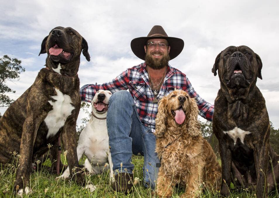 Motley crew: Bear Hasofer aka Bear the Dog Behaviourist with Bull, Bindie, Odie and Ollie, at his Ebenezer farm where he performs obedience and behavioural training. Picture: Geoff Jones