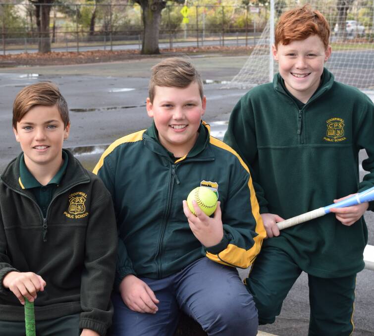 THE PRIDE OF THEIR SCHOOL: Softball reps Tallan Egan, Ashton Hunter and Lachlan Thompson are off to Wagga Wagga. PHOTO: Supplied.