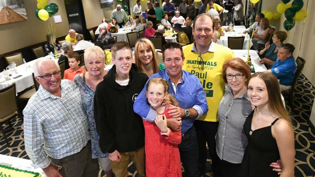FOUR MORE YEARS: Paul Toole with his family and supporters on election night.