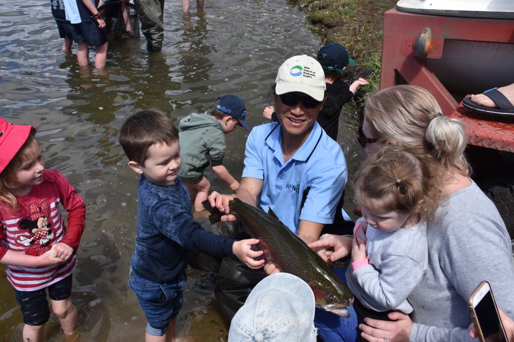 FAMILY FUN: Lake Wallace has been stocked with Rainbow Trout in preparation for the Gone Fishing Day. Pictures: Alannah Tomazin and Ray Tang.