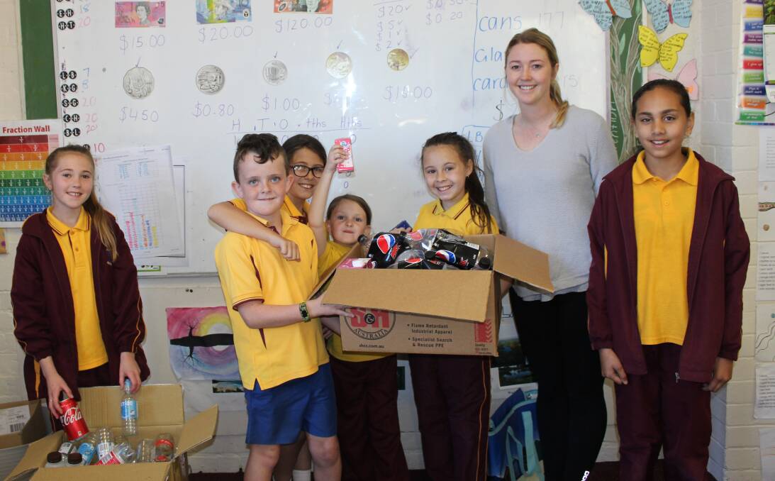 REUSE: During 2018, the Year 3/4 class and Miss Menchin became involved with recycling. Photo: Supplied