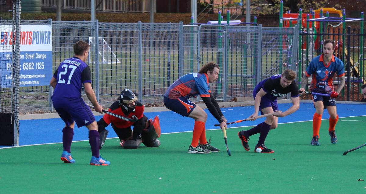 All the action from Orange Hockey Centre as Wanderers took on Lithgow Panthers. Photos: MAX STAINKAMPH