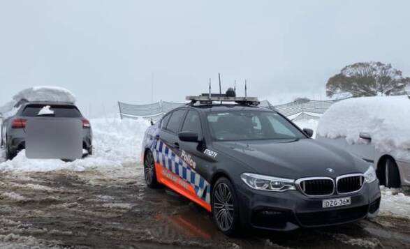 ALPINE CONDITIONS: Police are urging drivers to delay all non essential travel in the region this weekend, with snow expected in areas 500m above sea level. Photo: NSW Police Traffic and Highway Patrol