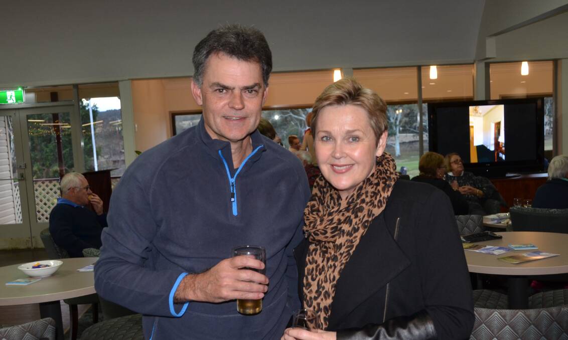 Greg and Donna Guest celebrate his "ace". Pictures: SUPPLIED