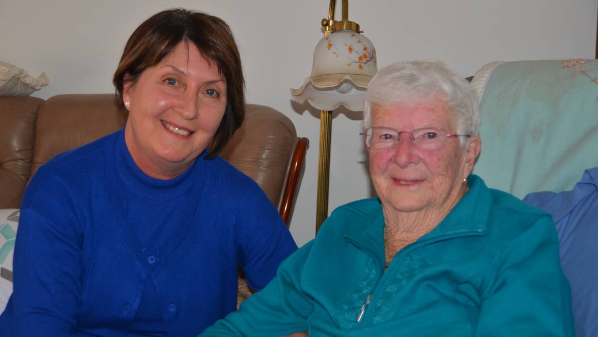 CLOSE BOND: Beryl Angwin with one of her carers Gail. Gail visits each Friday to do the housework and cook lunch, Beryl particularly enjoys her ham and chicken roll. Picture: HOSEA LUY