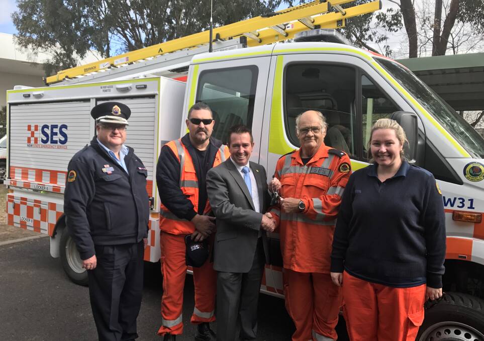 FRESH WHEELS: NSW SES Central West Region Controller Craig Ronan, Steve Saville Lithgow SES, Member for Bathurst Paul Toole, David Clapham Lithgow SES and Jade Richmond from NSW SES Fleet. Picture: SUPPLIED