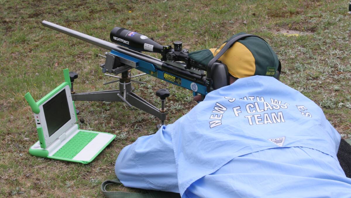 The new electronic targets at the Lithgow Small Arms Rifle Club in use by member Brett Bond. Pictures: SUPPLIED