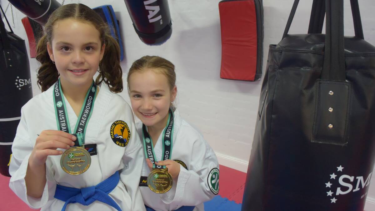 GOLDEN GIRLS: Jorja Pender and Alexis Reid are rising stars in taekwondo and their recent Australian Championship golds are just another step on their journey. Picture: HOSEA LUY