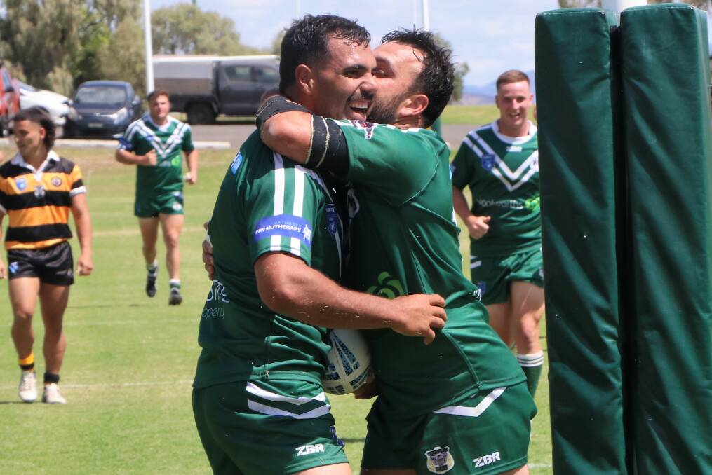 Jeremy Thurston is set upon by Alex Ronayne after one of his six tries for the Western Rams on Saturday. Picture by NSW Rugby League