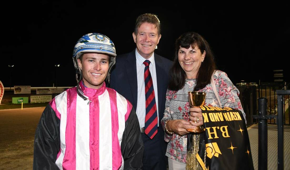 GOOD NIGHT OUT: Todd McCarthy with his mother Narelle and Harness Racing NSW CEO John Dumesny after his Gold Chalice win. Photo: CHRIS SEABROOK