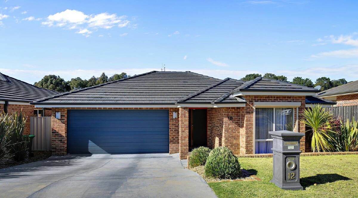 IMMACULATE INSIDE AND OUTSIDE: 12 Diamond Drive is a delightful open plan family home, ready to move in and enjoy.