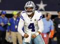 Dallas quarterback Dak Prescott led the Cowboys to a 41-35 win over the Seattle Seahawks in the NFL. (AP PHOTO)