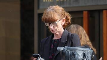 Lisa Anne Perryman is on trial after her late husband attacked a neighbour with a chainsaw. (Ethan James/AAP PHOTOS)