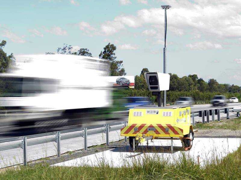 Additional warning signs around mobile speed cameras in NSW will return next year. (Dave Hunt/AAP PHOTOS)