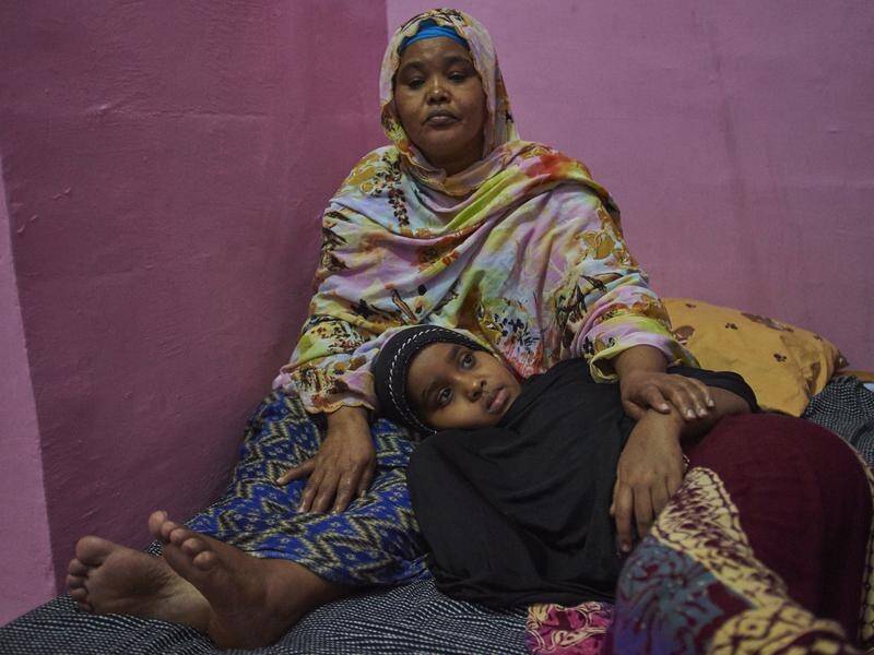 Somalian refugee Safiya and her daughter were smuggled to Indonesia after her husband was beheaded.