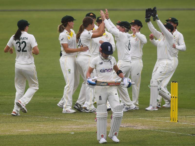 Australia celebrate Darcie Brown's maiden Test wicket on day two of the Ashes match against England.