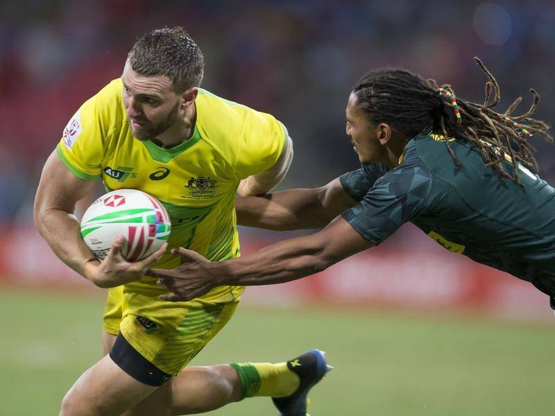 Former Australian sevens captain Lewis Holland is to link with the Melbourne Rebels in Super Rugby.