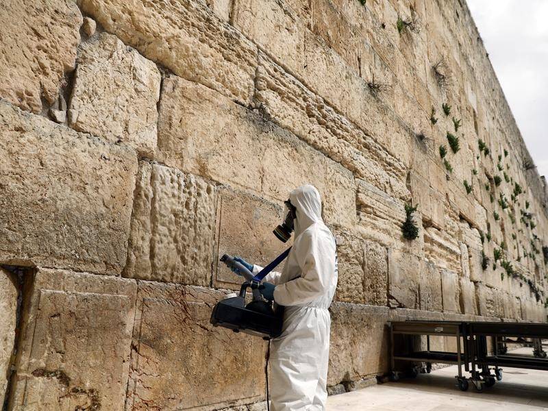 Cleaners have sanitised the stones of the Western Wall as part of measures to battle COVID-19.