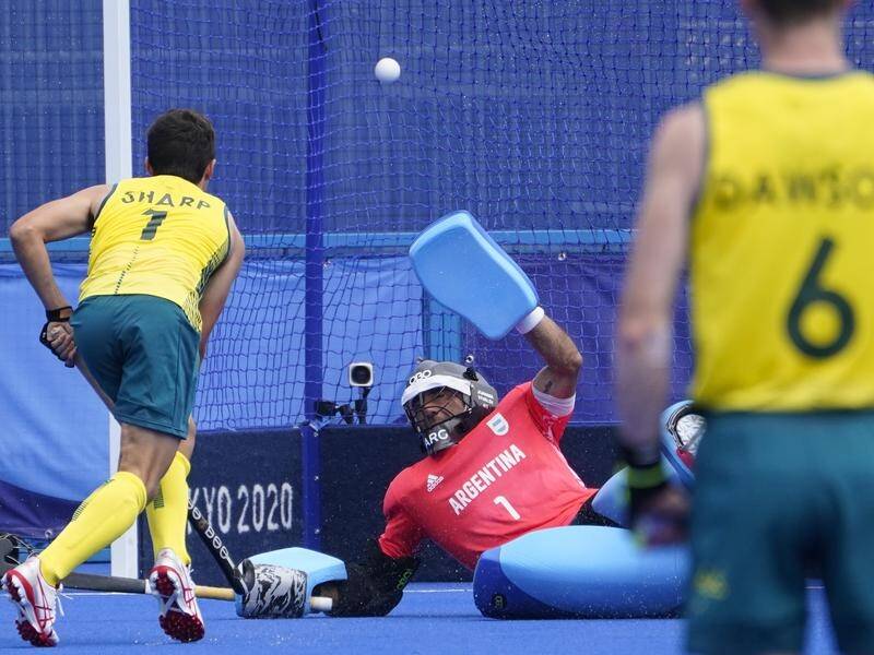 SHOT'S ON: Lithgow's Lachlan Sharp hits the back of the net for Australia scoring his first Olympic goal.