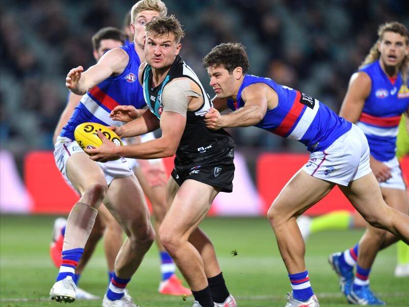 Ollie Wines played an influential role as Port Adelaide defeated the Western Bulldogs in the AFL.
