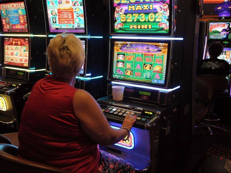 Laws to end Tasmania's poker machine monopoly have passed but critics say it's a missed opportunity.
