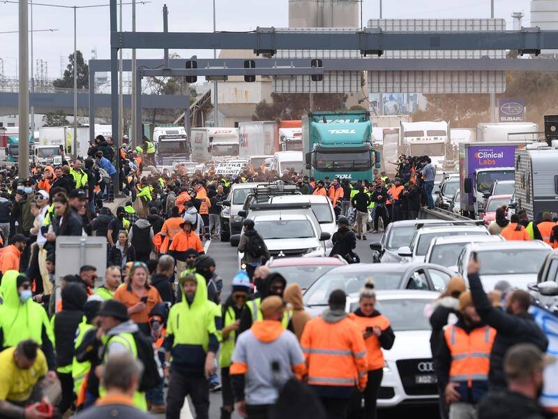 Protesters moved on to Melbourne's West Gate freeway after a confrontation with riot police.