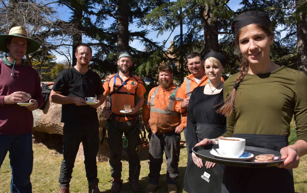 CUPPA TIME: Crew members from Agile Arbor Tree Service with Bianca and Tina, who were part of the cafe training course. 