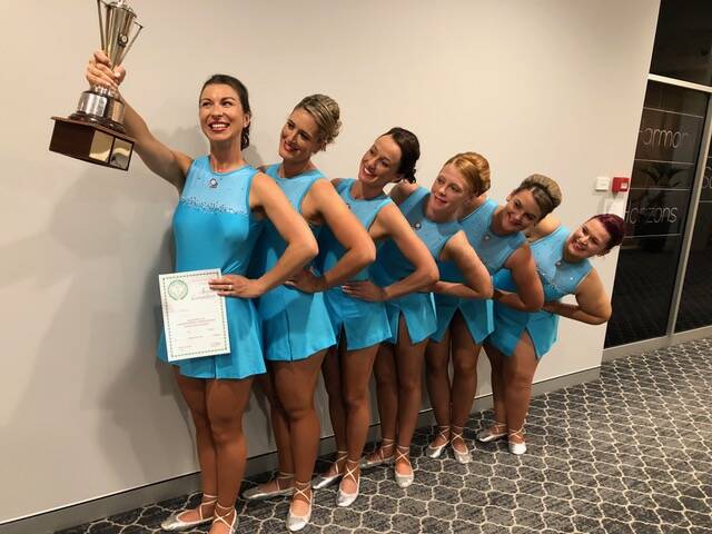 TROPHY TIME: State champions Stacey Jones, Lisa Caligari, Donna Bignell, Rebecca Nolan, Jenna Mergen and Sarah Tracey. 