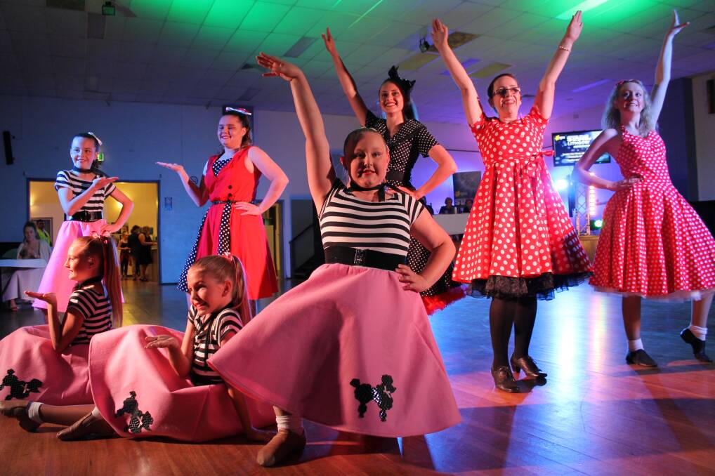 A STEP IN TIME: Lithgow Mercury editor Kirsty Horton tries to keep up with the girls from La Balle School of Dance at Saturday's Dance for Cancer event.