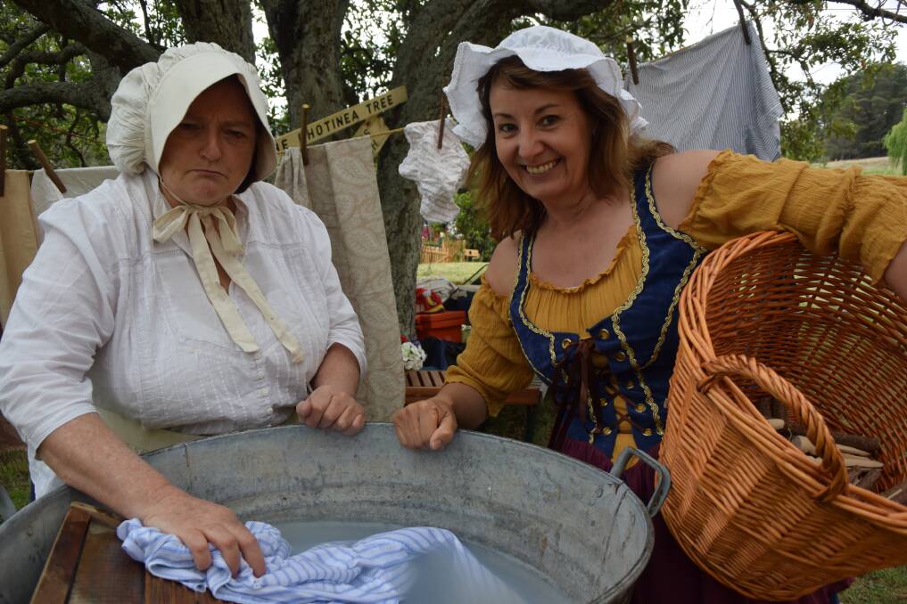 A WASHERWOMAN'S LOT: Fiona Grove and Vicki Hartley from the Lithgow Living History group. Pictures: KIRSTY HORTON. 