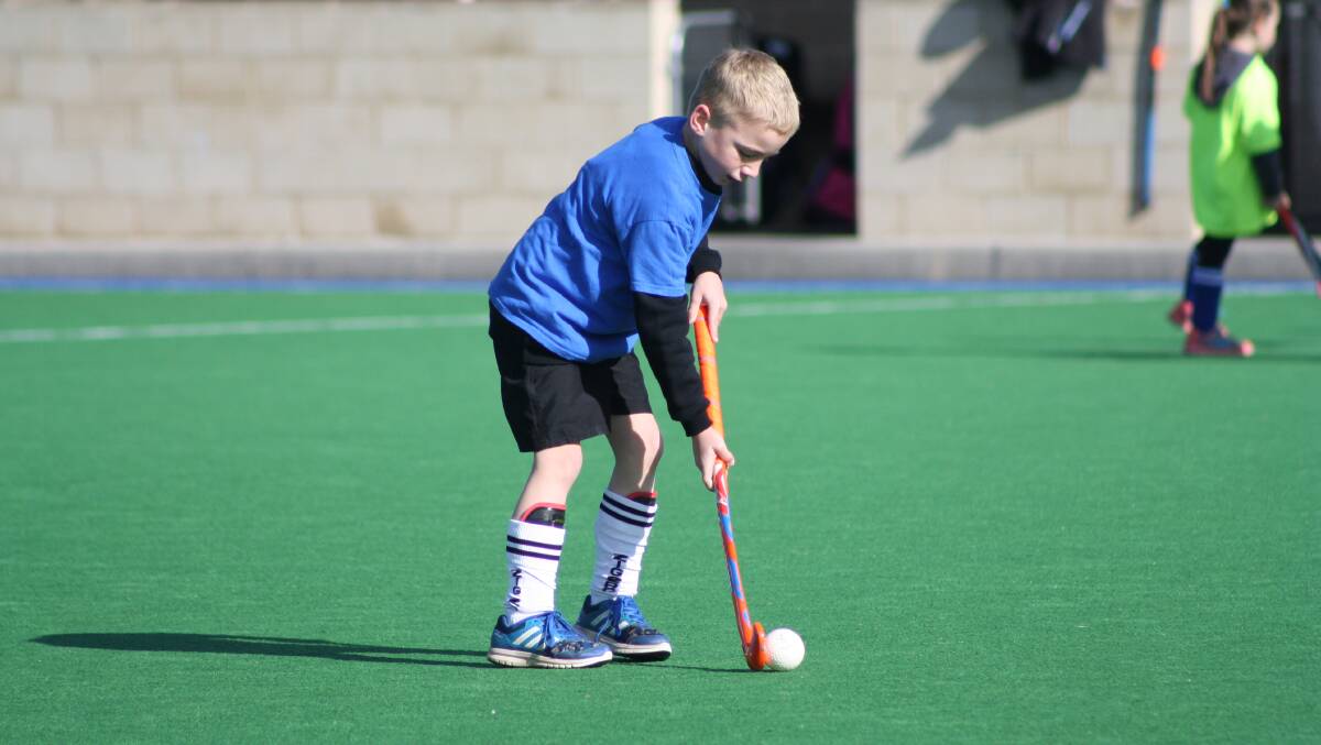 Lithgow's Minkey hockey players were hard at work in their last game before the school holiday break on Saturday, June 24. 