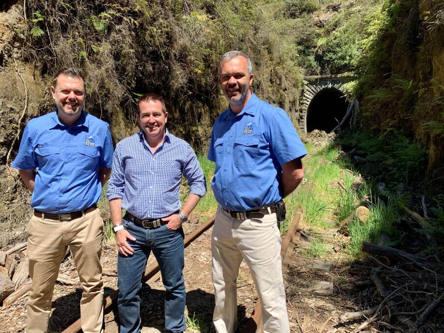 Bathurst MP Paul Toole delivering some good news to Zig Zag Railway
volunteers Ben Lawrence, left, and Cameron McGinty.