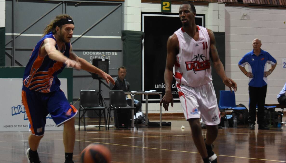 HITTING THE COURT: Lazers' Michael Johnson in action against the Heat. Picture: SUPPLIED. 