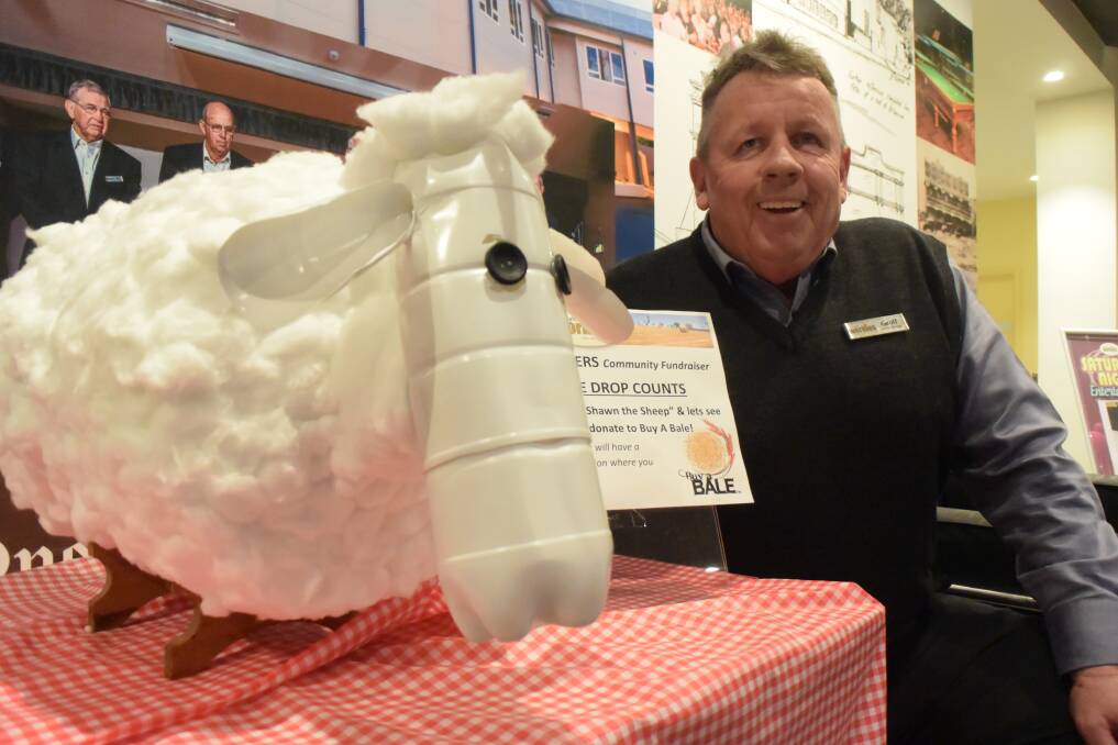 FUNDRAISING DAY SEPTEMBER 9: Lithgow Workies' Geoff Wheeler with Shaun the Sheep. Picture: KIRSTY HORTON. 