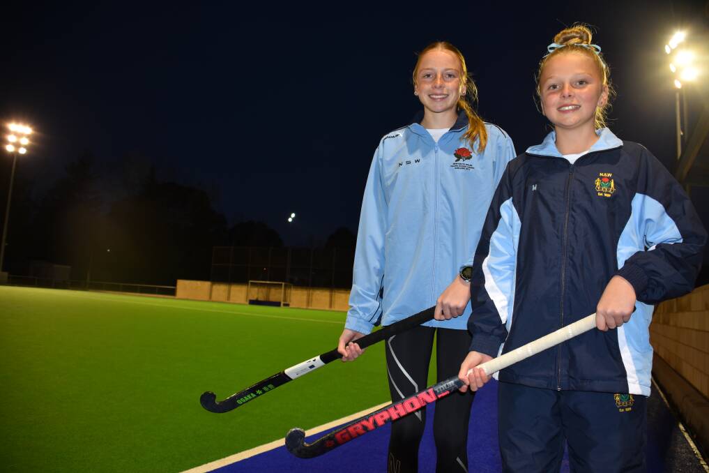 BLUES: Emily and Maggie Thompson ready to represent their state. Picture: KIRSTY HORTON. 