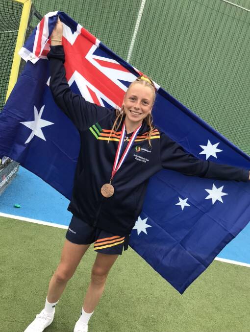 BRONZE: Emily Thompson proudly displays her medal. Picture: SUPPLIED. 