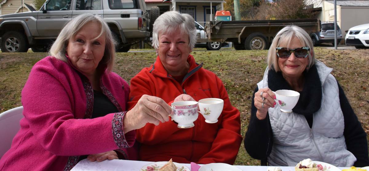 CHEERS: Christina Lewis, Julie Grany and Carolyn Andison enjoy a cuppa at the 2018 event. 