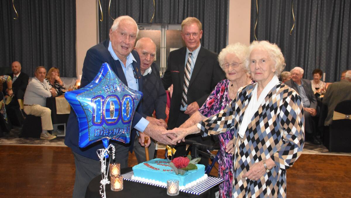 CENTENARY BIRTHDAY: Club Lithgow life members cut the cake with president Wayne Allan. Picture: ALANNA TOMAZIN.