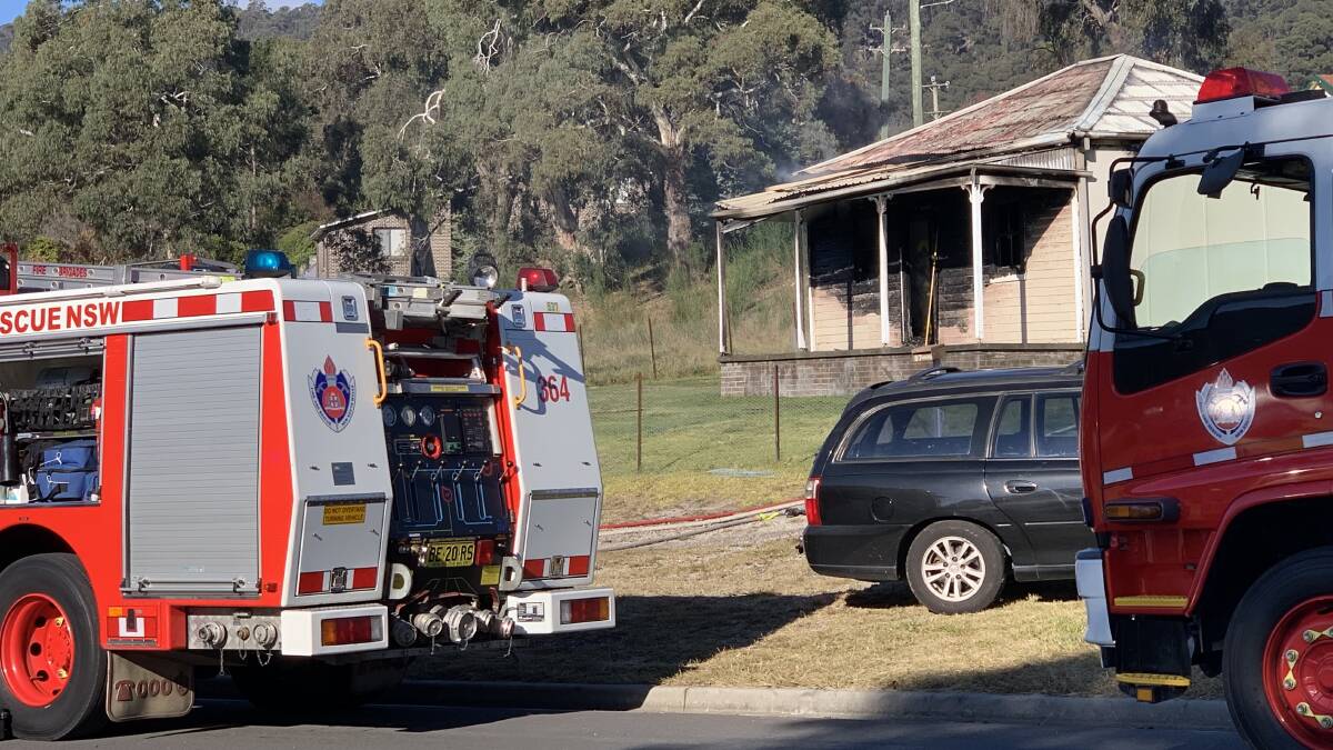 FIRE: Emergency services on the scene of a house fire at Pottery Estate. Picture: ALANNA TOMAZIN. 