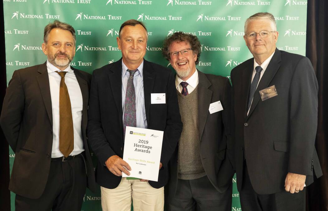 AWARD: Richard Silink, National Trust Deputy CEO, stonemason Ron Lodewijks, Fr Paul Devitt, Vicar General, Catholic Diocese of Bathurst and Patrick Cooper, Diocesan Financial Administrator, Catholic Diocese of Bathurst. Picture: SUPPLIED. 