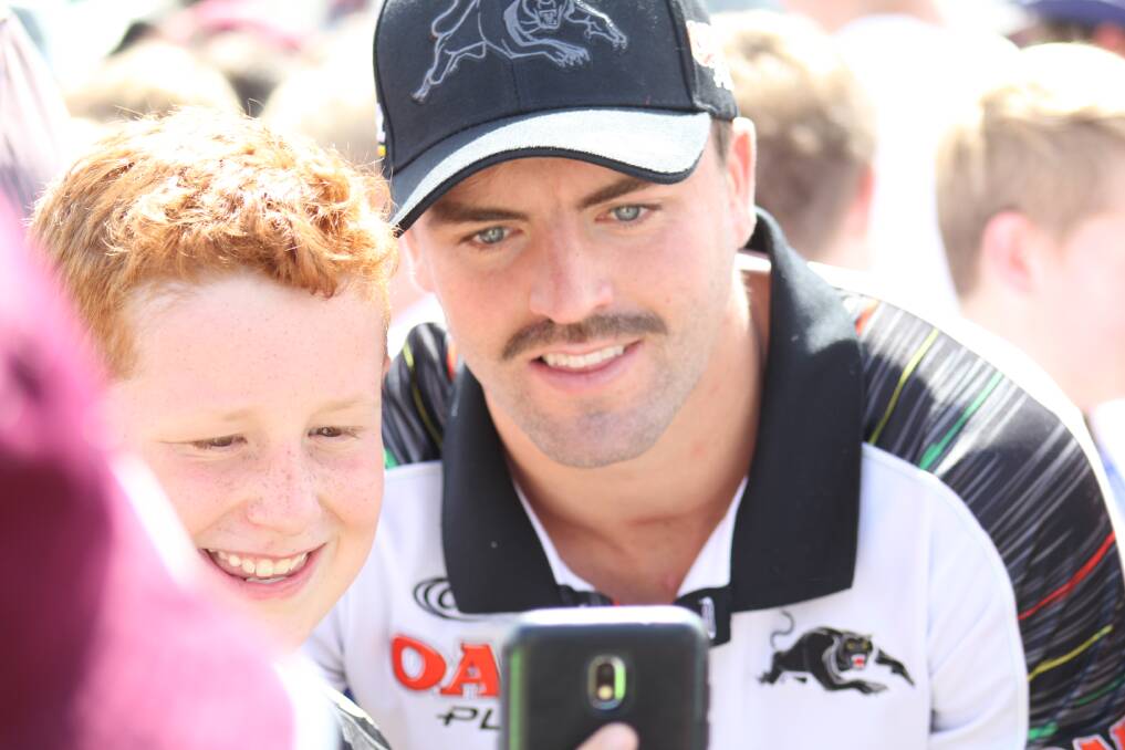 THRILLING FANS: Wayde Egan pictured with a fan during his visit to Bathurst recently. Picture: BRADLEY JURD. 