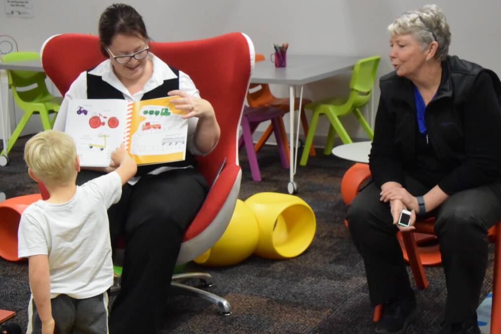 READ ALONG: Children's librarians Kellie Drengenberg and Scotia Tracey reading for Simultaneous Storytime in 2018. 