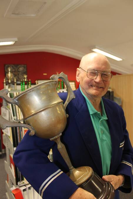 CUP: Together at last, at the Lithgow Library Learning Centre Sandy Davidson was reunited with the Blue Bird Cafe Cup to correct a snub from 67 years ago.