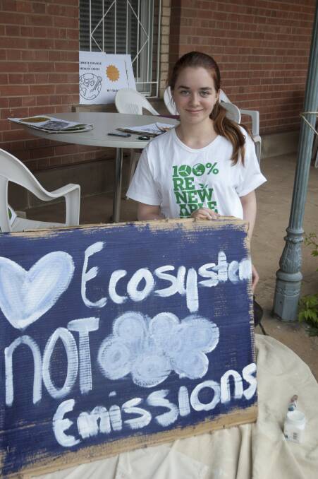 CALL FOR ENTRIES: High school student Erin Mullen preparing for a climate change action rally in 2015. Picture: Tracy Sorensen/BCCAN.