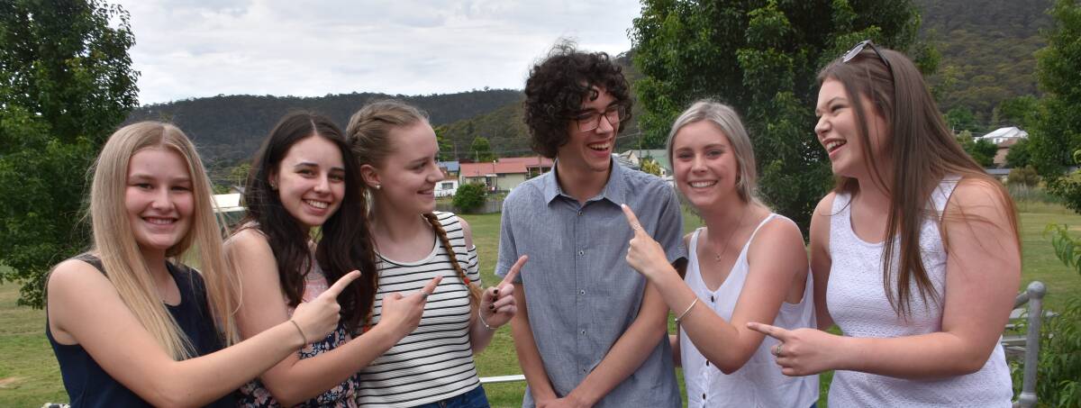 THIS GUY: Callum Woodrow (centre) and some of his successful classmates goof around back at La Salle Academy after receiving their ATAR on December 15. Pictured are Ebony Brown, Mikaela Inzitari, Rebecca Drury-Doohan, Callum Woodrow, Lauren Corney and Maddy Griffiths. Pictures: KIRSTY HORTON. 