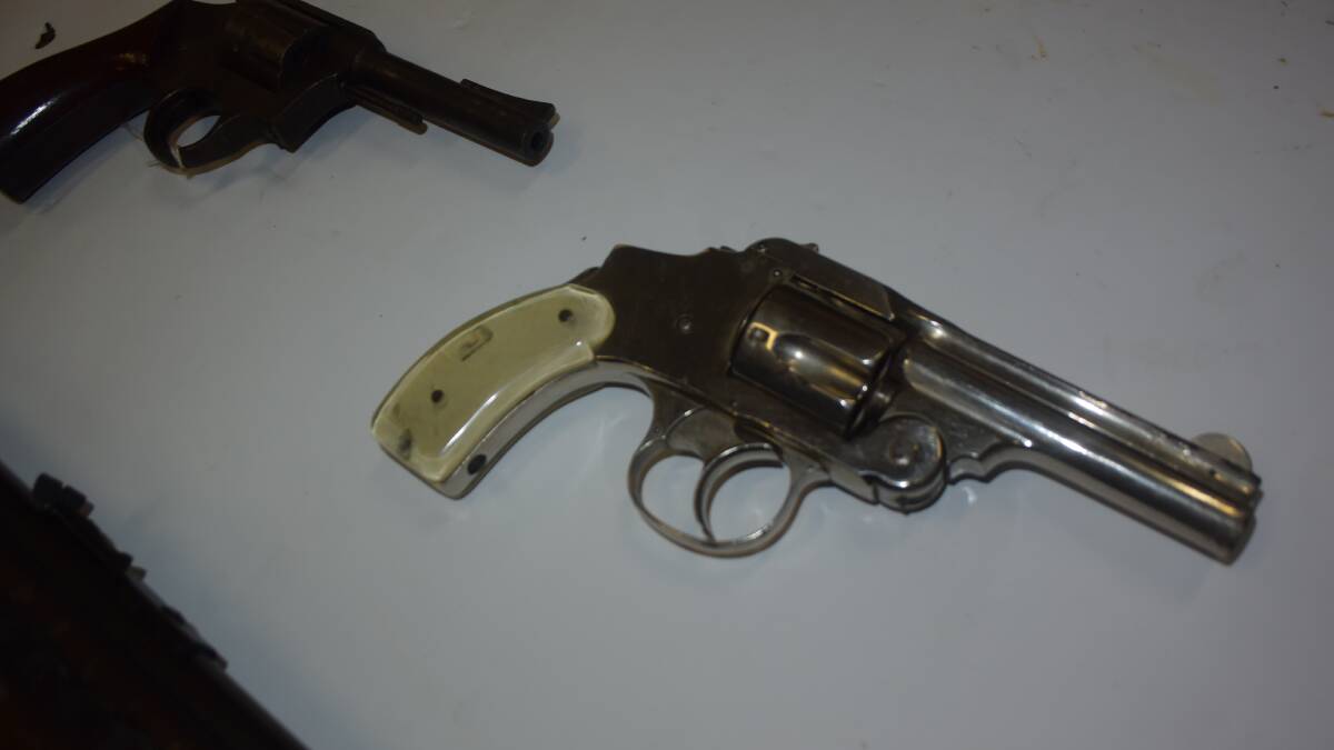 The hammerless Smith & Wesson pistol. 